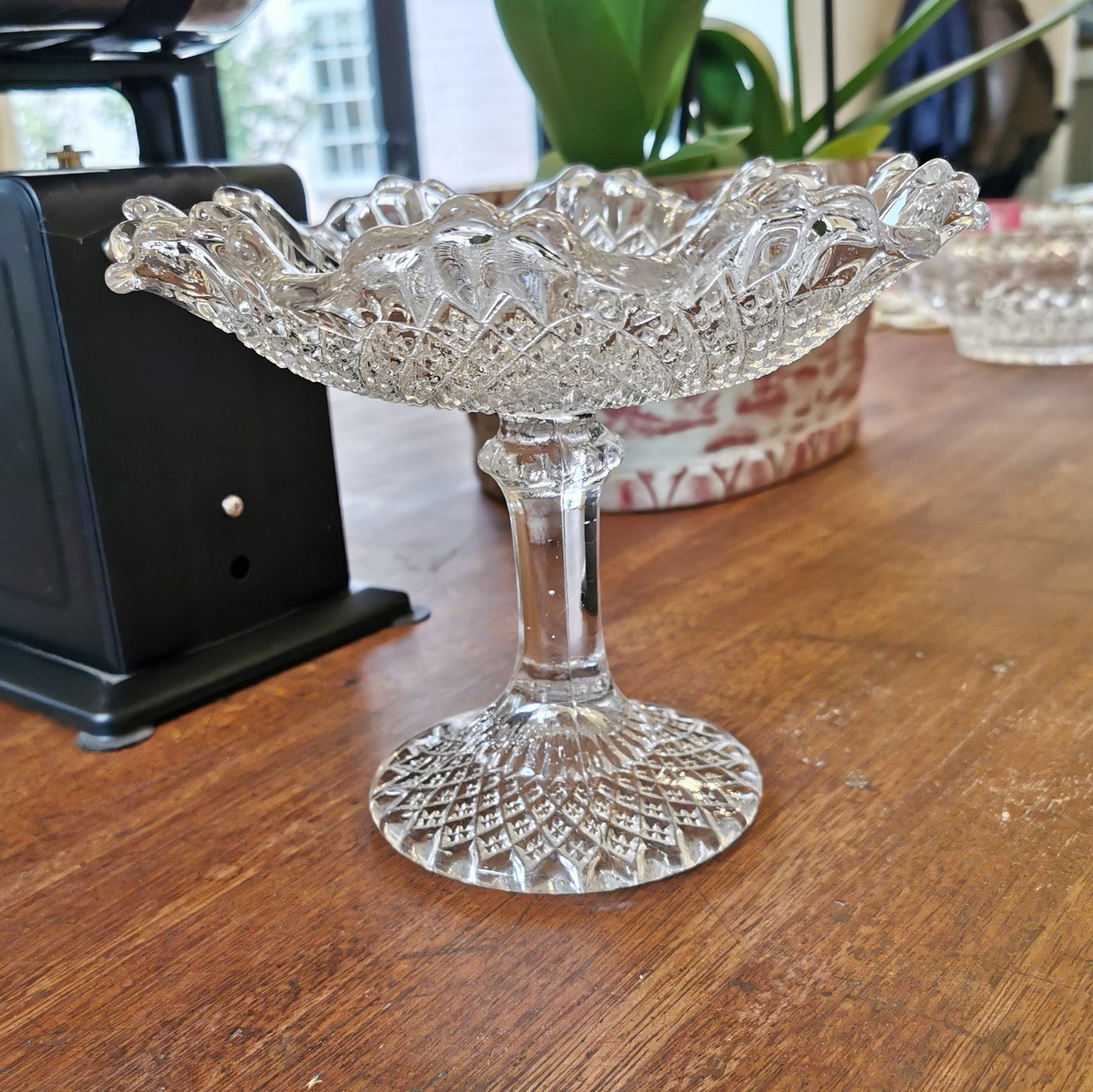 A pair of English Quarter-Molded Pedestal Glass Table Fruit Stands