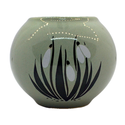 Holkham pottery vase with snowdrops
