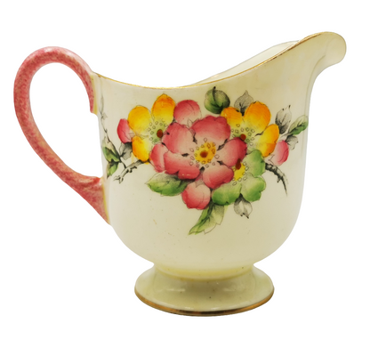 Antique Paragon China Apple Blossom G746 Milk Jug Decorative ceramic pitcher with floral design on a white background