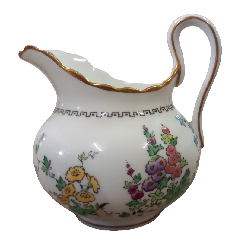 plant tuscan hollyhock milk jug