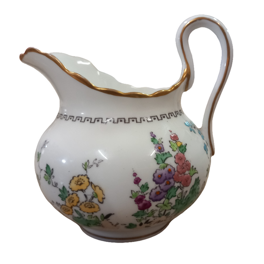plant tuscan hollyhock milk jug