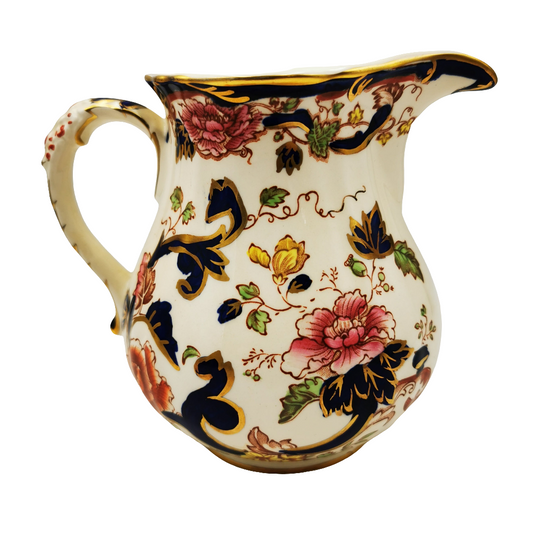 Masons Mandalay Blue Ironstone China 1-pint Milk Jug Decorative ceramic pitcher with floral patterns on a white background