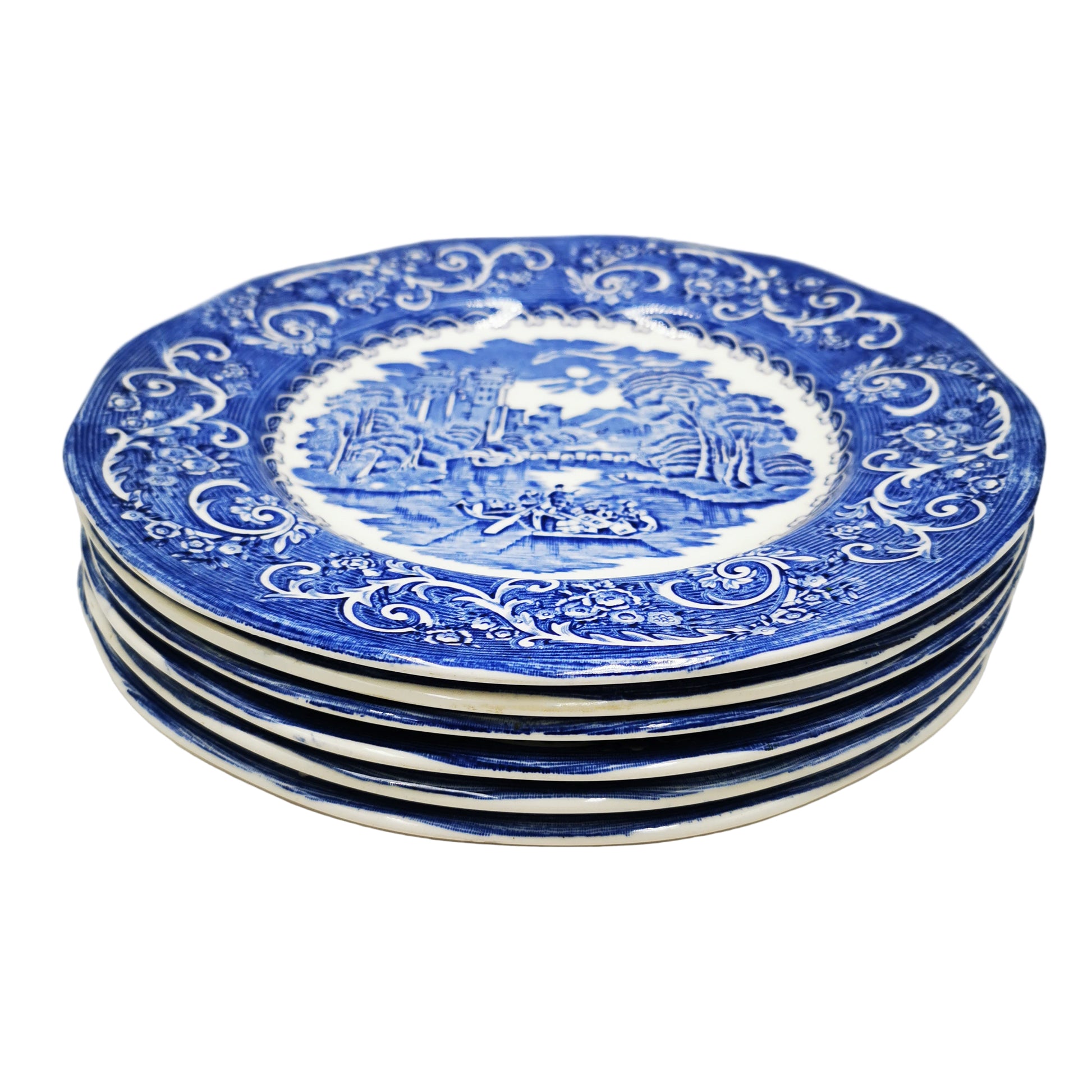Set of blue and white decorative plates with intricate patterns on a white background