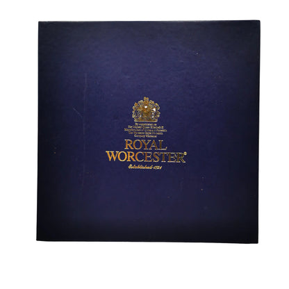 Blue box with gold text and logo of Royal Worcester on a white background
