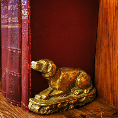 A Pair of Cast Brass Dog Book Ends