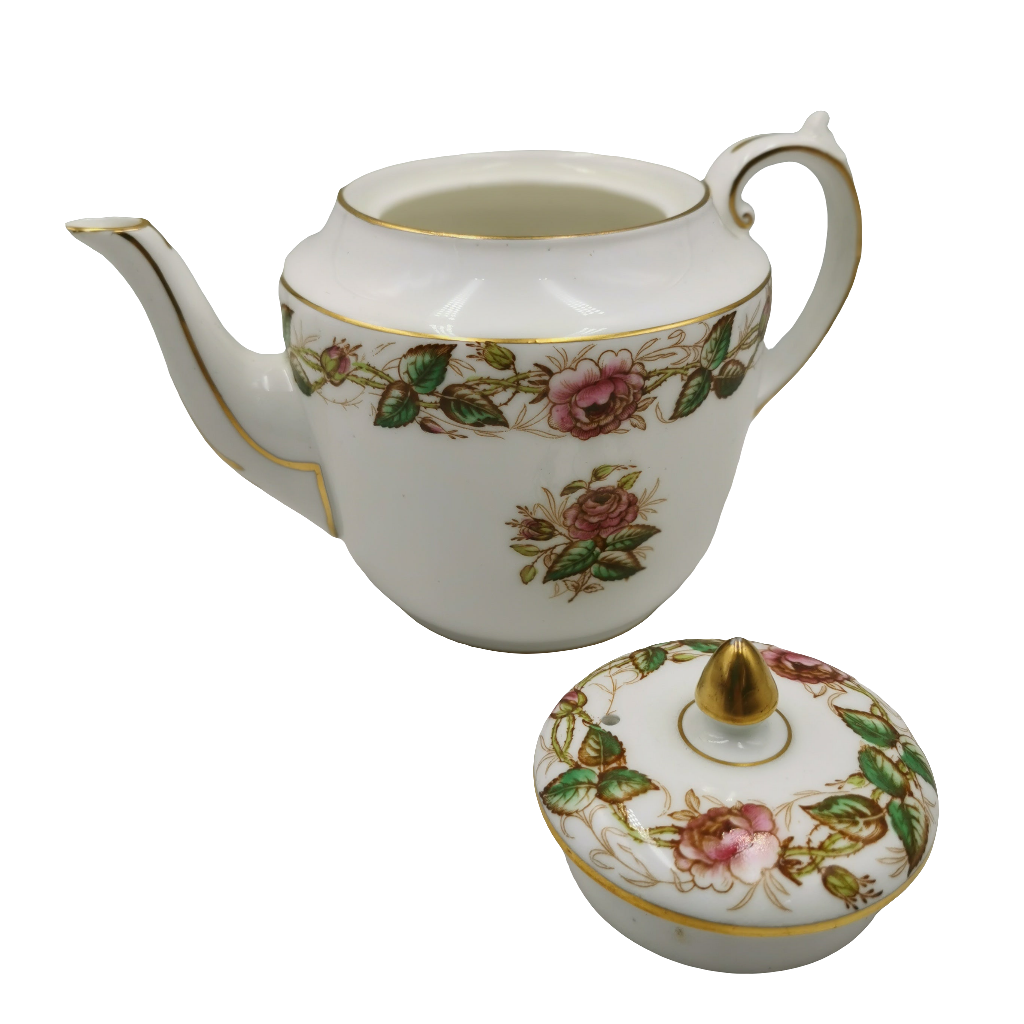Cartwright & Edwards Victoria China Chelsea Tea Pot
Ceramic teapot and matching sugar bowl with floral patterns on a white background