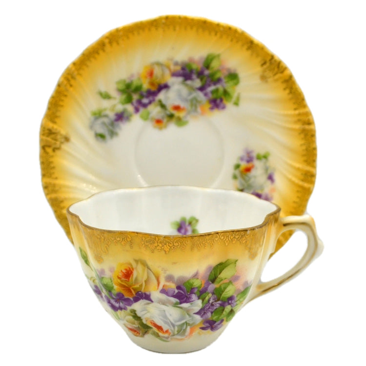 Antique Floral China Shell Molded Tea Cup and Saucer