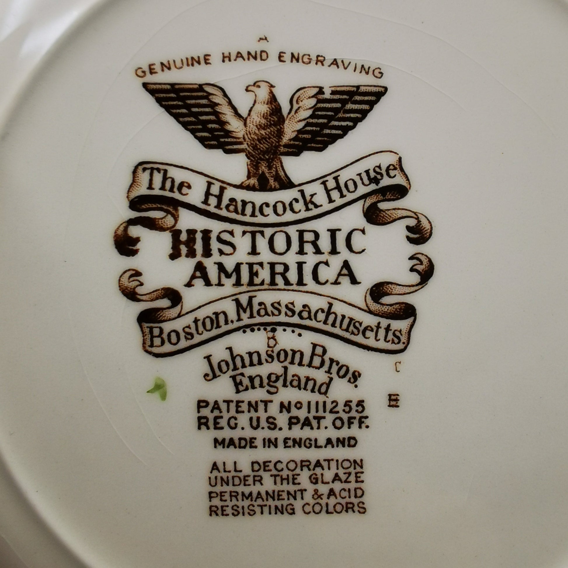 Ceramic plate with 'The Hancock House Historic America' branding