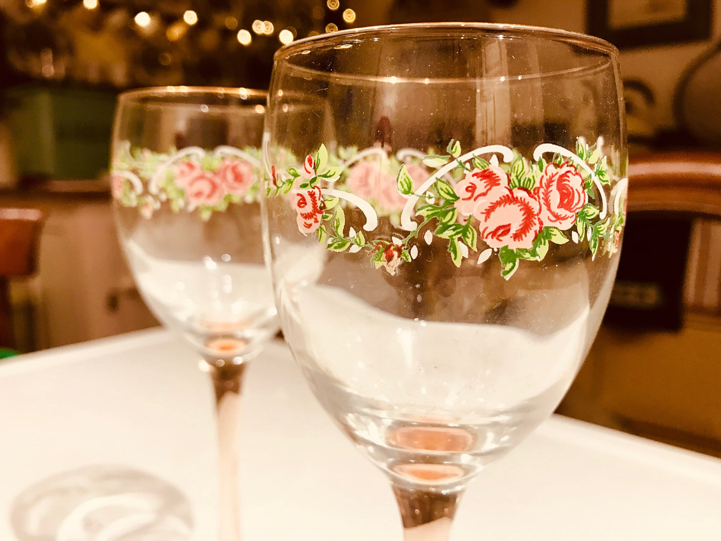 Vintage floral pink stemmed wine glasses sold as a pair