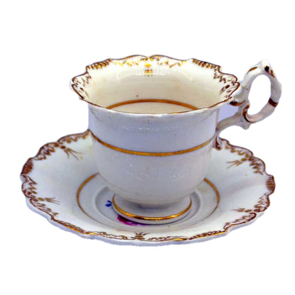 Antique floral tea cup and saucer