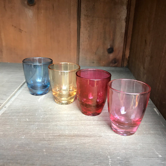 Set of four vintage coloured shot glasses