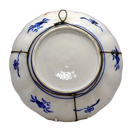 imari plate in wire frame