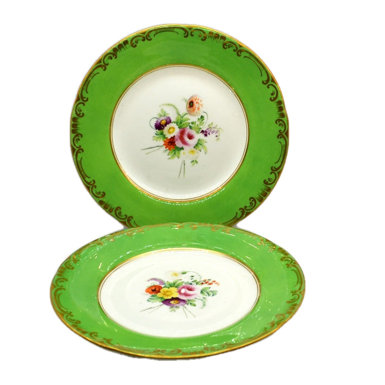 A pair of Antique Floral China Wall Plates